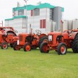 Fonterra plant towers over vintage tractors
